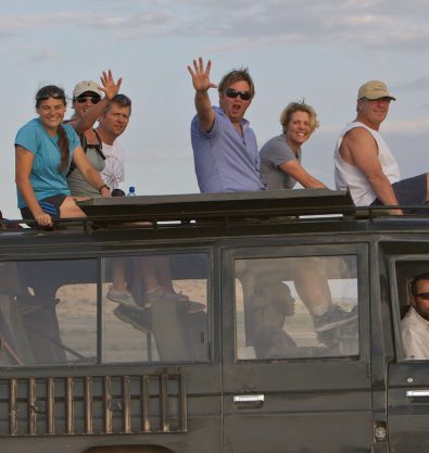 Family on top of truck